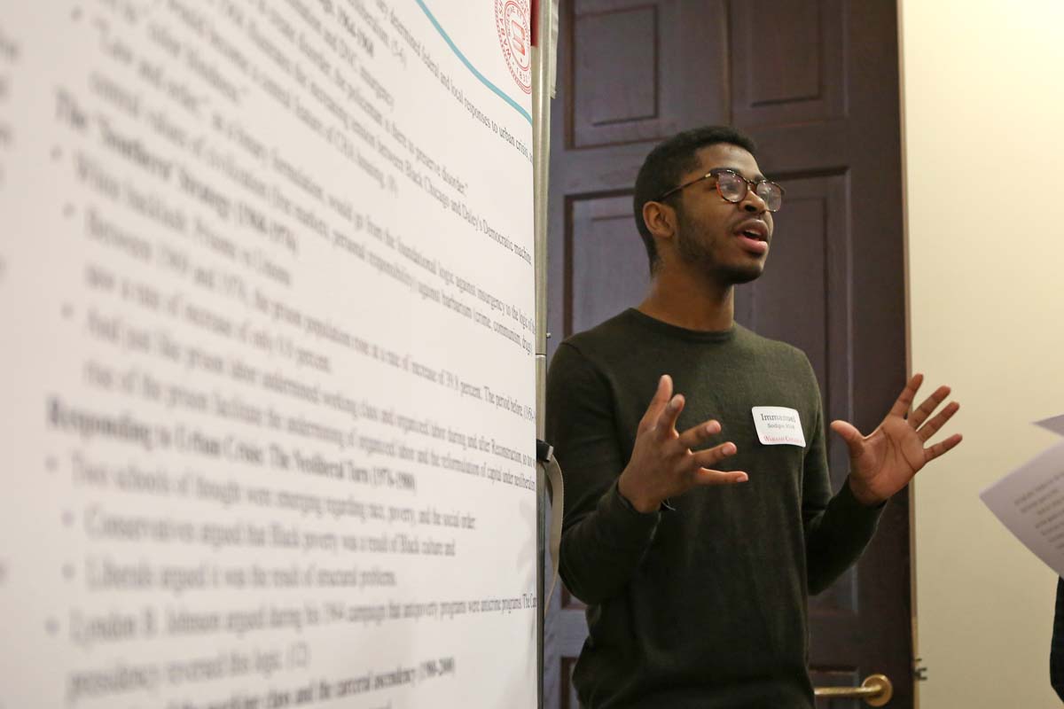 Immanuel Sodipe ’18 argues the mass incarceration, as counter-insurgency, not only facilitated the rise of Neo-liberalism, but remains a central aspect of it during the Celebration of Student Research, Scholarship, and Creative Work.