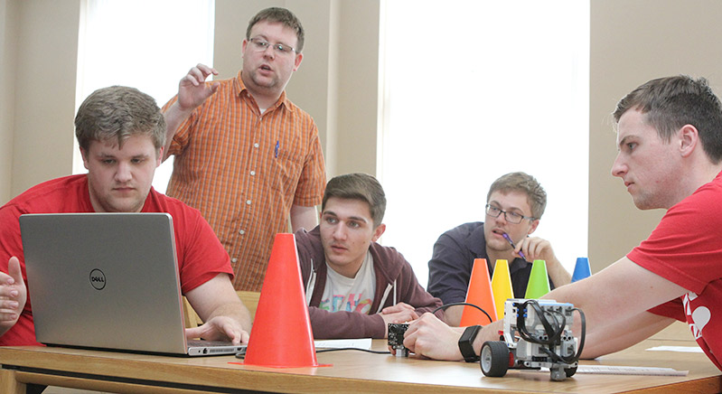 Students learn coding through robotics.