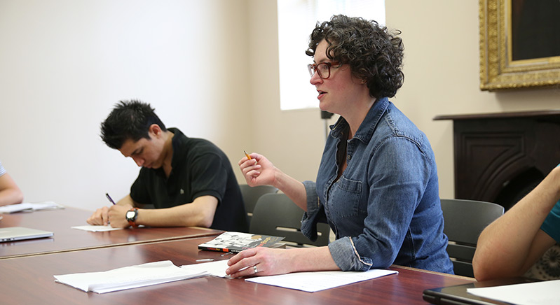 Professor Crystal Benedicks leads a gender studies discussion.