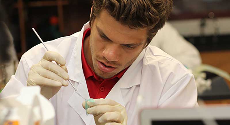 Artie Equihua in a biology lab