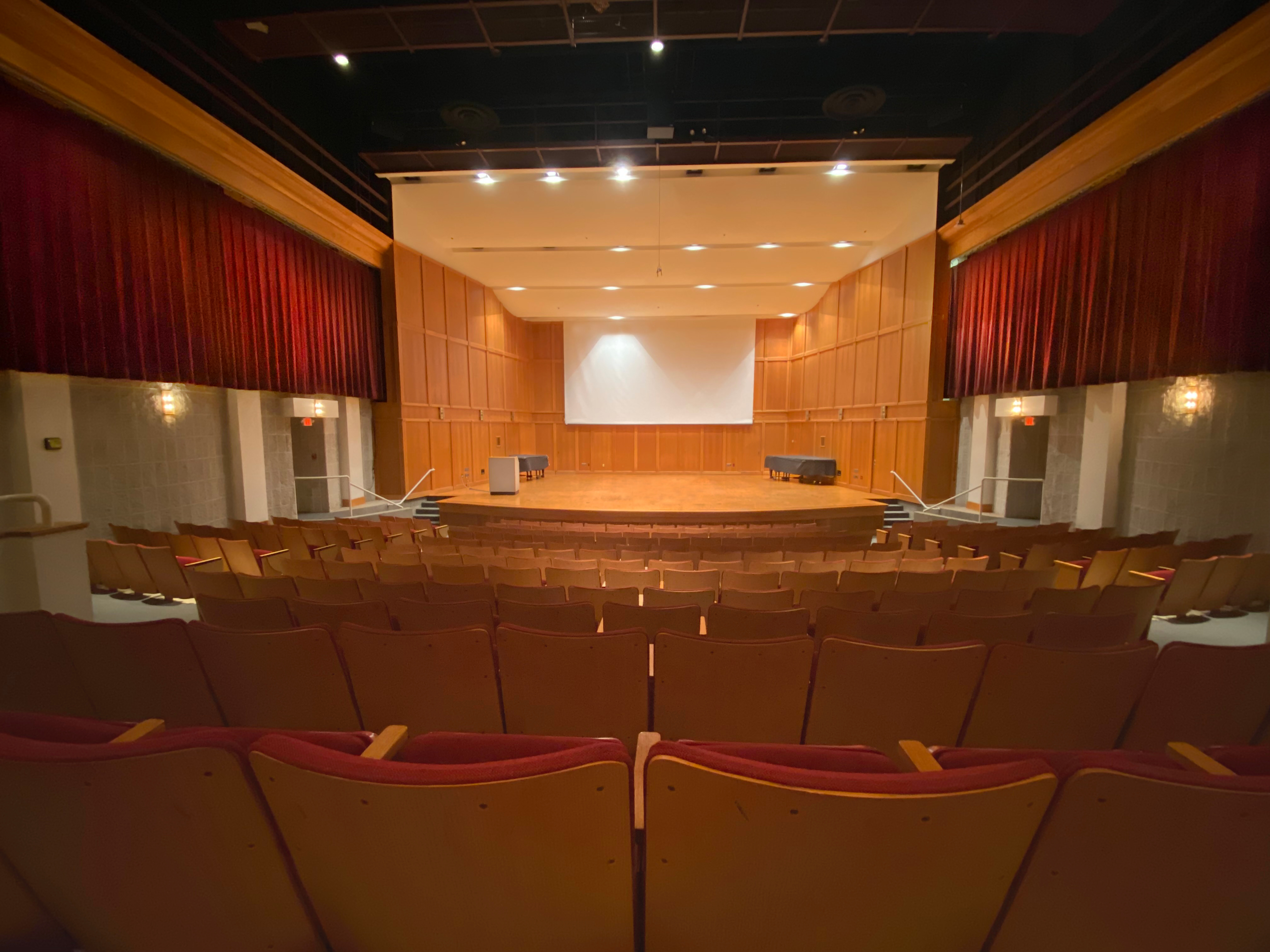 A view from the center of Salter Hall's audience, looking at the stage