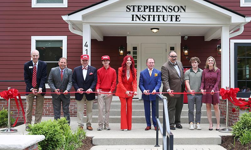 Stephenson family and guests at the ribbon cutting.