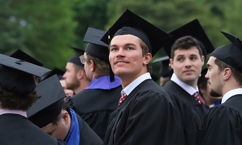 a group of people in graduation gowns