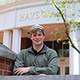 Aidan Mason &rsquo;26 in front of Hays Hall