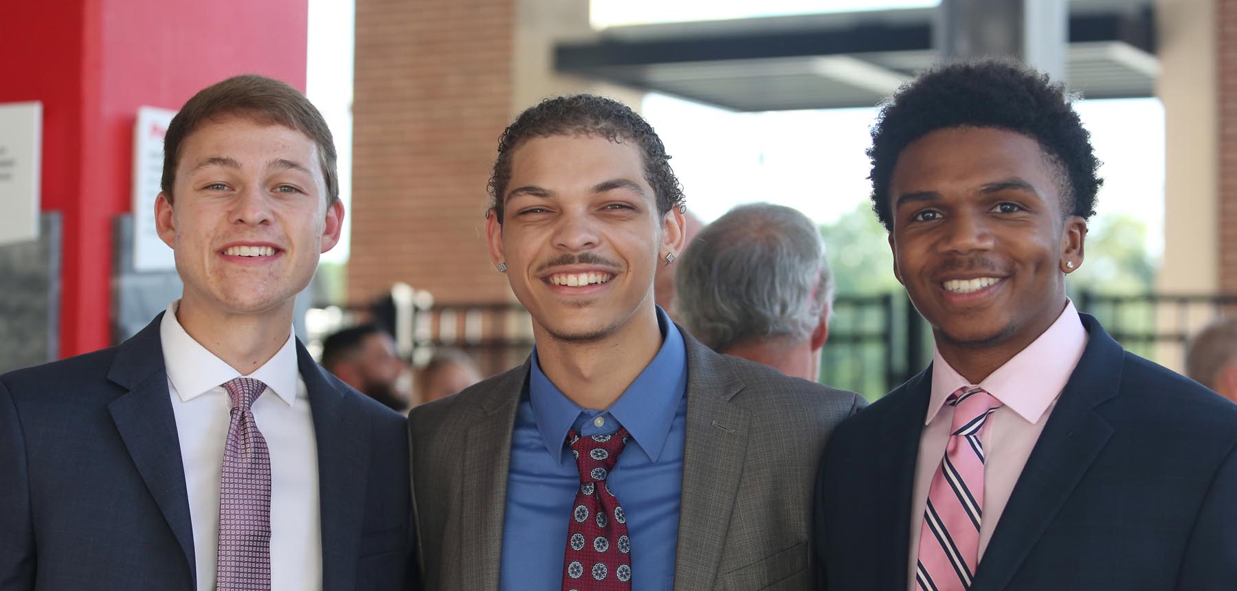 Jack Davidson '21, Gianni Minor '22, and Edreece Redmond '24