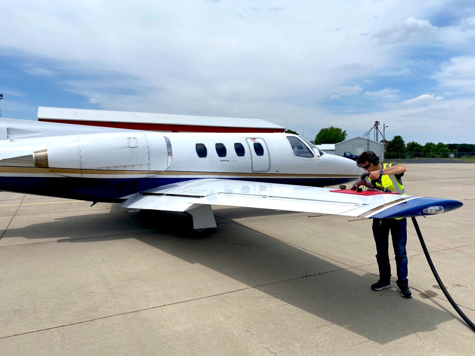 Pine helps the Crawfordsville Regional Airport staff with fueling operations.