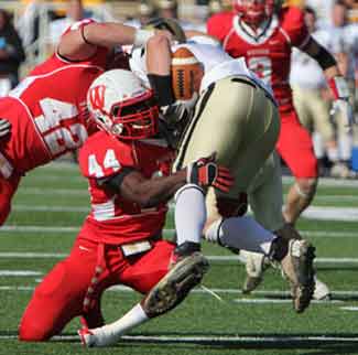 Akinribade and Scola on the big hit.