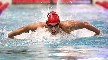 Colaiacova races in the Class of 1950 Natatorium.