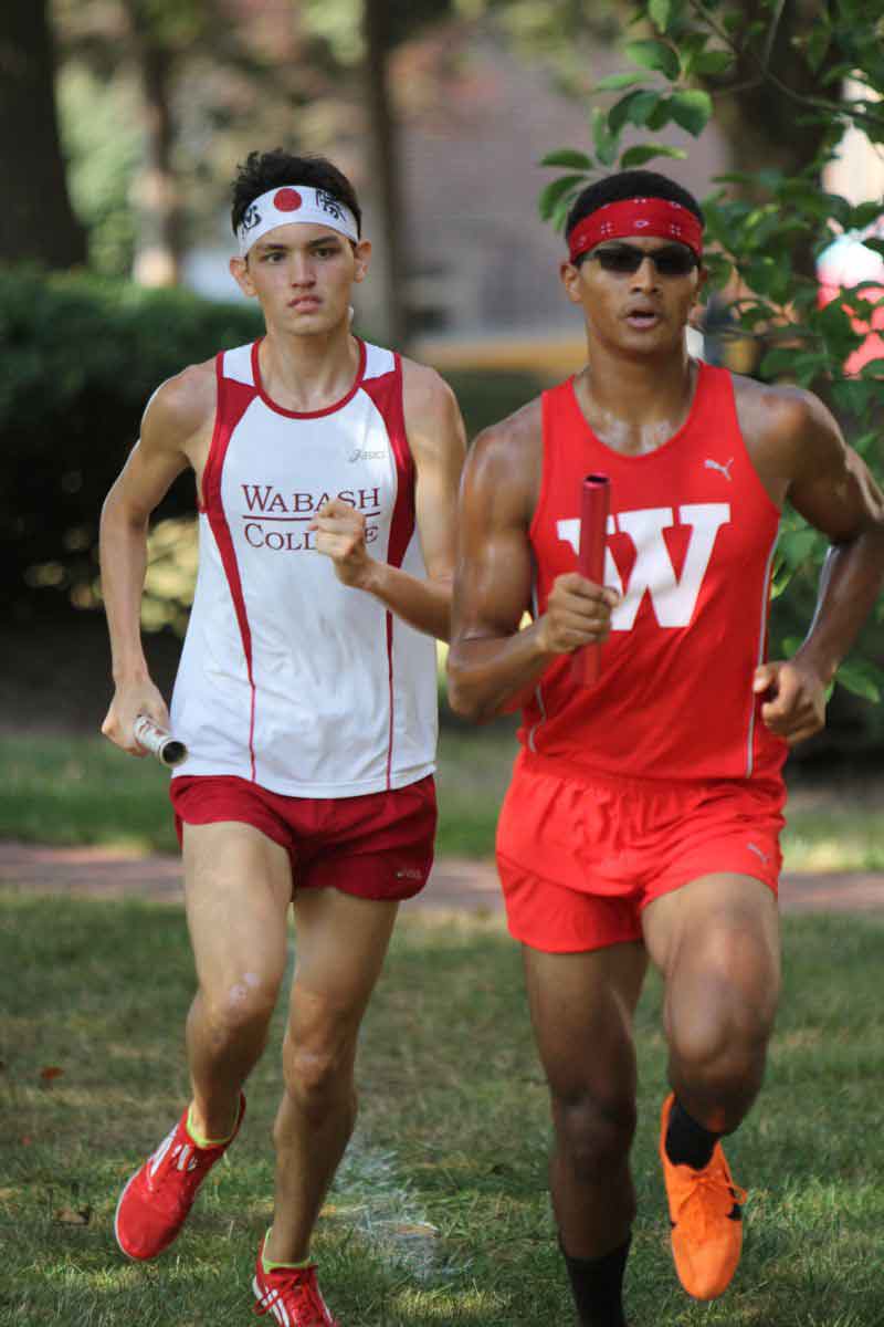 Adam Togami (left) and Jacob Caddick helped the Little Giants capture the 2013 Indiana Intercollegiate Little State Championship title Friday. The win lifted Wabash to the top spot in this week's US Track and Field and Cross Country Coaches Association regional poll.