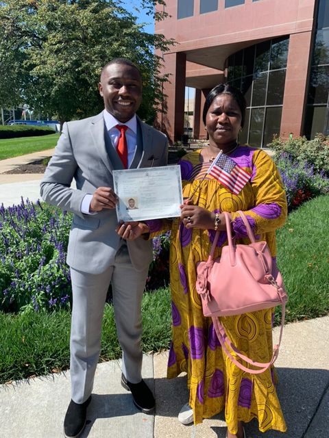 Ngaba with his mother after becoming a U.S. citizen. 