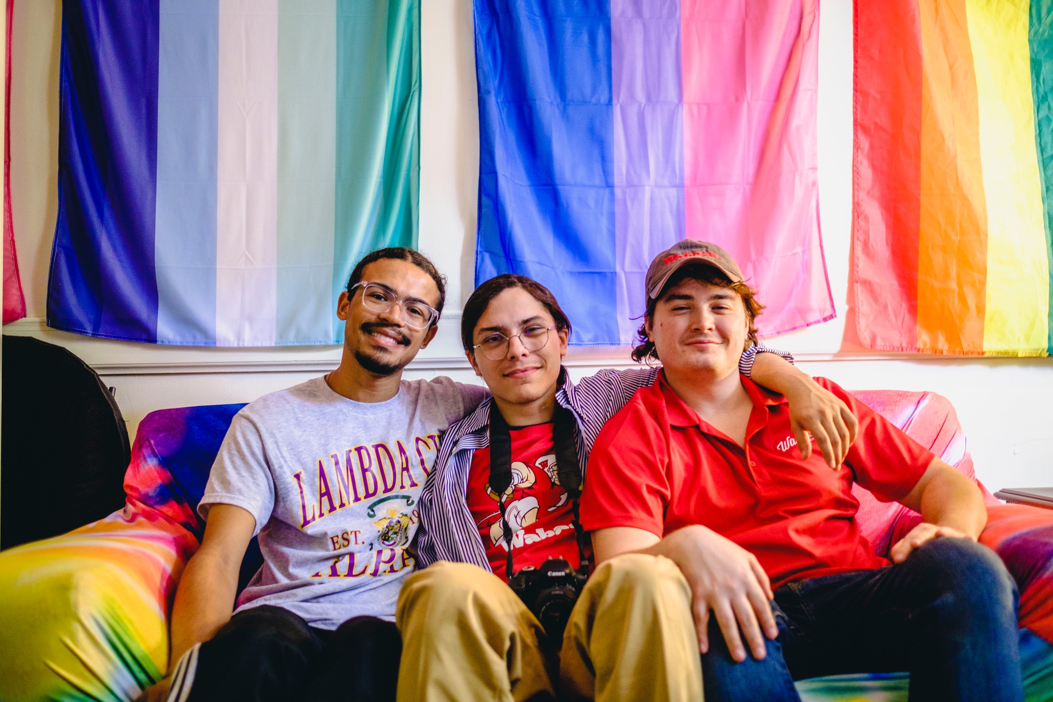 Current President Luis Rivera ’25, Hawk Ricketts ’23, and Alvarado gather at the ’shOUT open house in October in celebration of LGBTQ+ History Month.