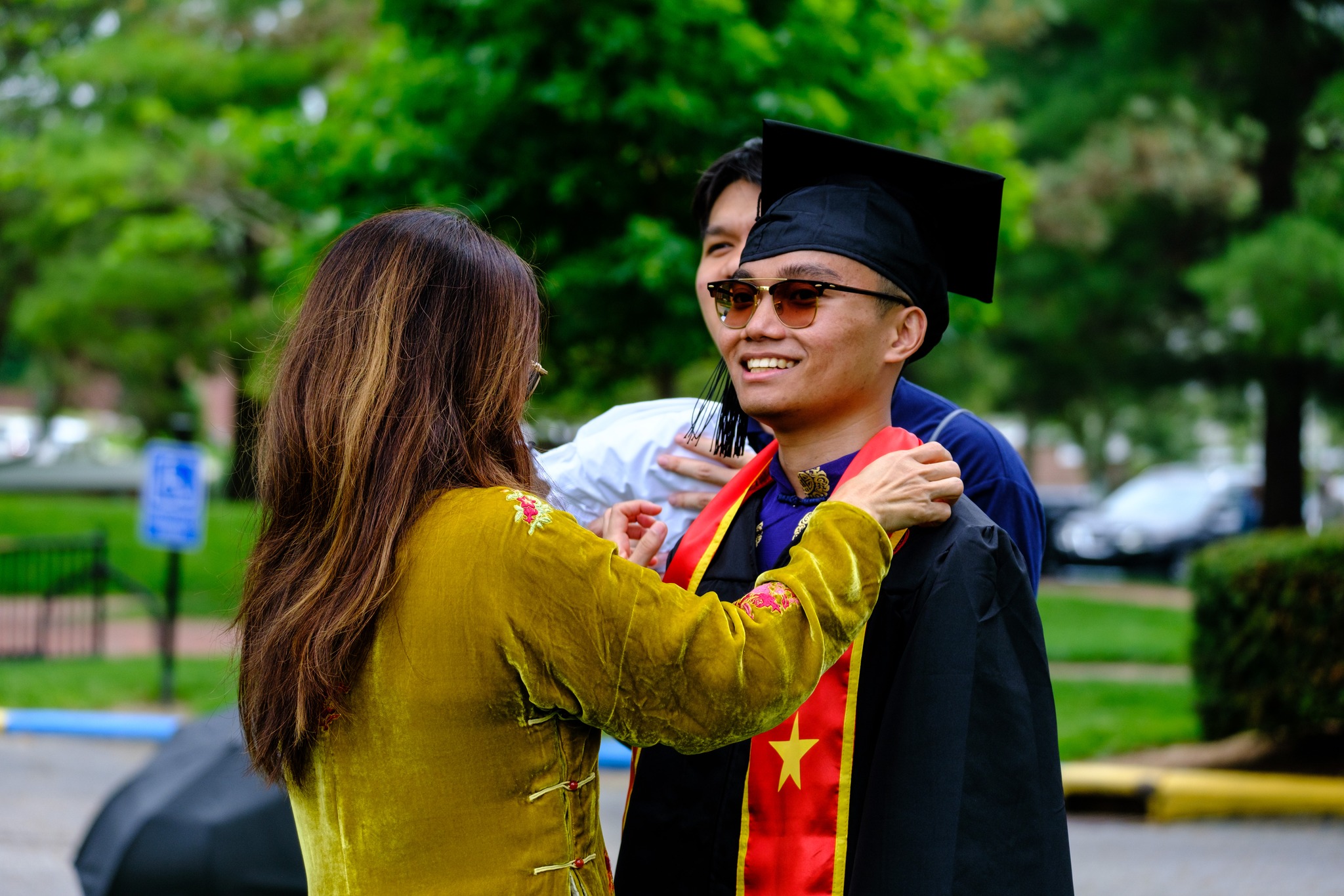 Khoi Truong ’23 and his family prepare for Wabash College’s 185th Commencement ceremony. 