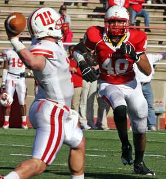 Putting pressure on the Wittenberg quarterback last season.