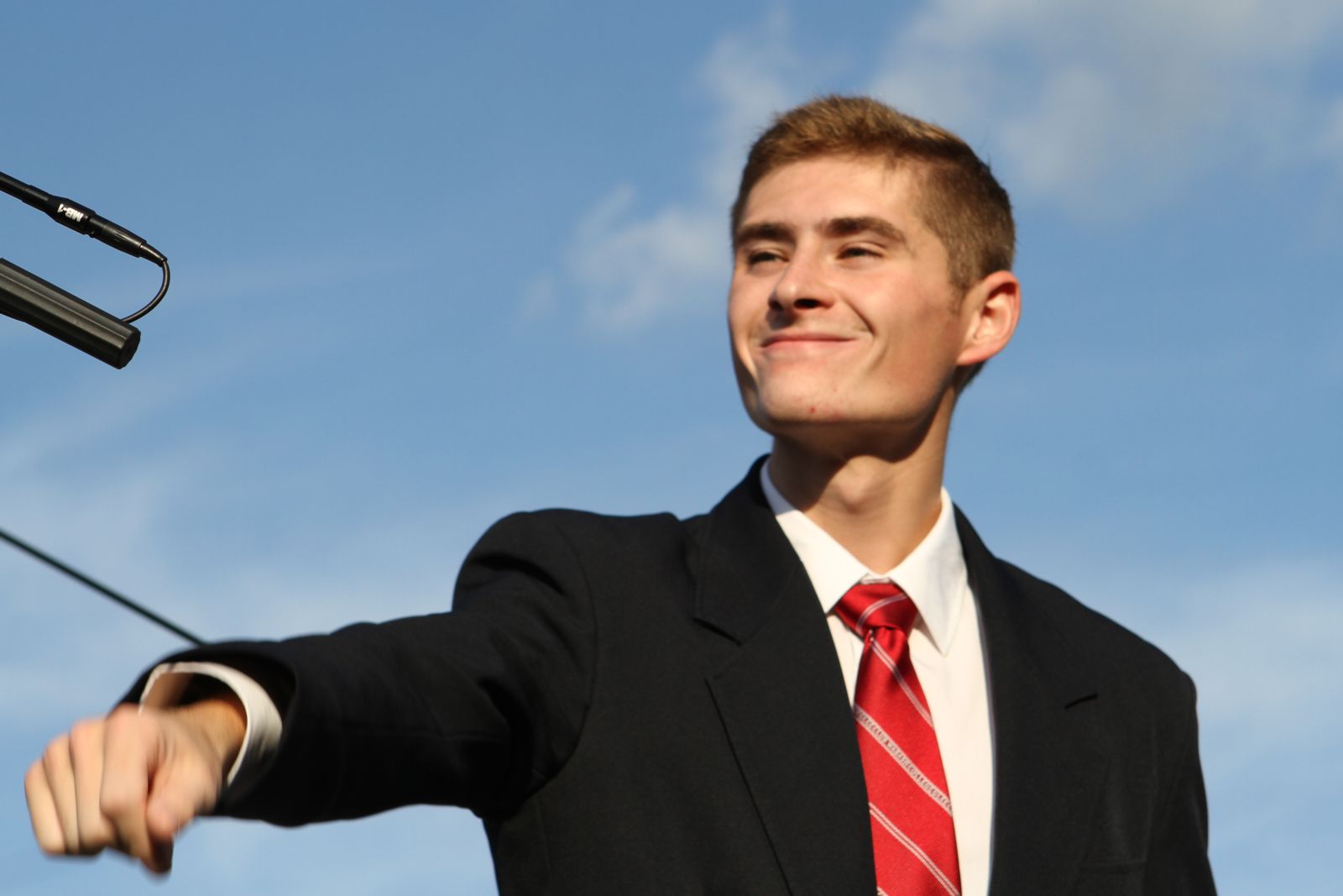 Will Borland ’22 conducting Glee Club's performance at President Scott Feller’s inauguration.