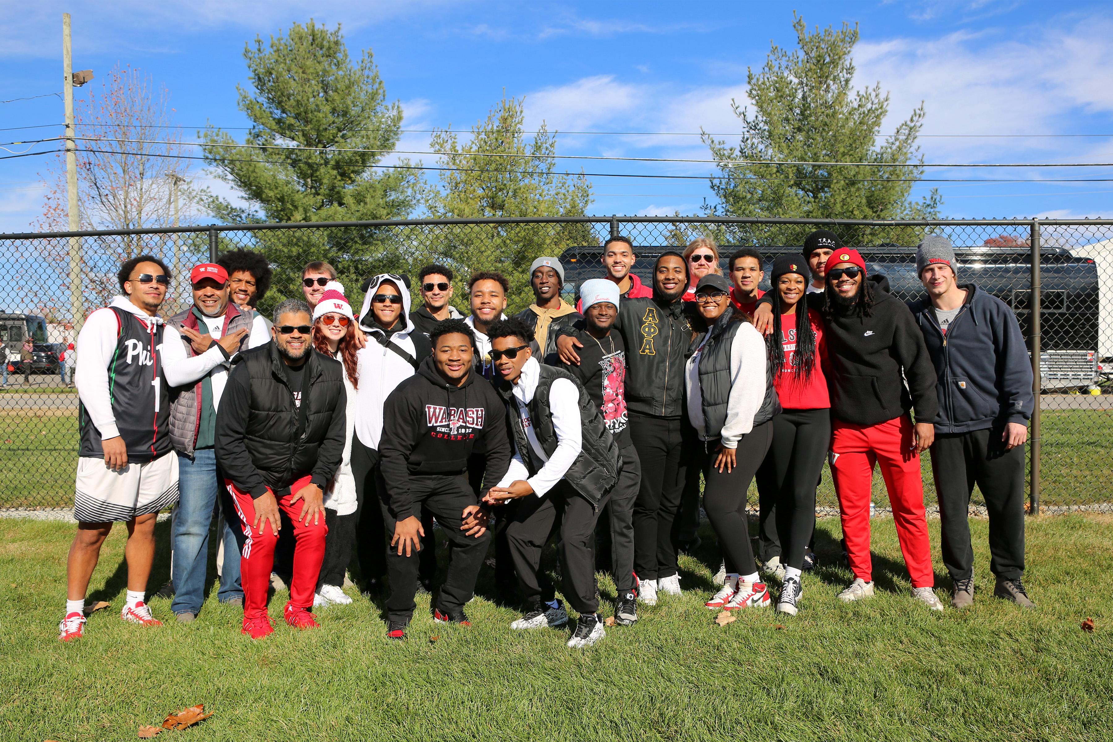 Thomas with his MXI family and friends at a home football game.