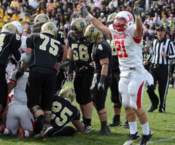 Gibson celebrates a Little Giant fumble recovery last year against DePauw