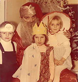 Agata (far right) with Santa during a party at her mother's school.