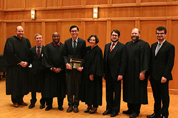All four finalists pose with the night's panel of four judges.