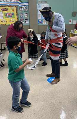 Clanton ’15 interacts with his elementary school students.