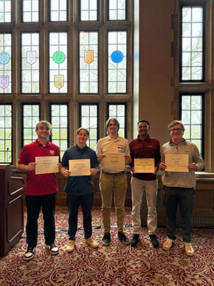 The editorial staff of The Bachelor (from left) Will Duncan '27, Owen Vermeulen '28, Nathan Ellenberger '26, Sean Bledsoe '26, Paul Hawksworth '28 at the Indiana Collegiate Press Association awards ceremony in Bloomington, Indiana.