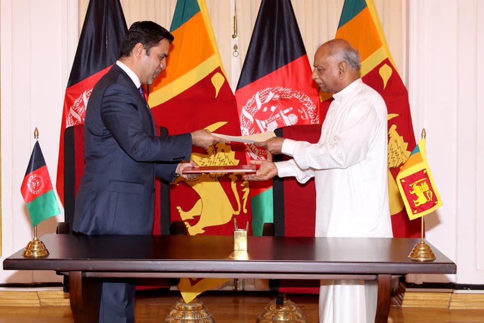 Haidari with Sri Lankan Foreign Minister Dinesh Gunawardena at the Bilateral Cooperation MOU Signing on April 7, 2021.