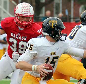 Cody Buresh closes in on quarterback Welp.