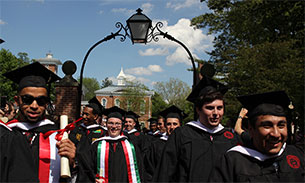 Graduates under the Senior Arch.