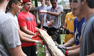 Wabash students performing community service in August 2019.