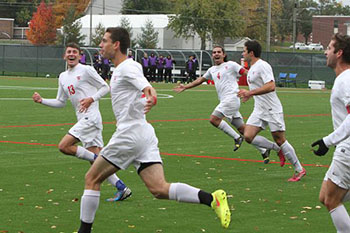 The Little Giants celebrate Krsteski's game-winning goal.