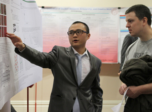 Students are on hand to answer questions about their research.