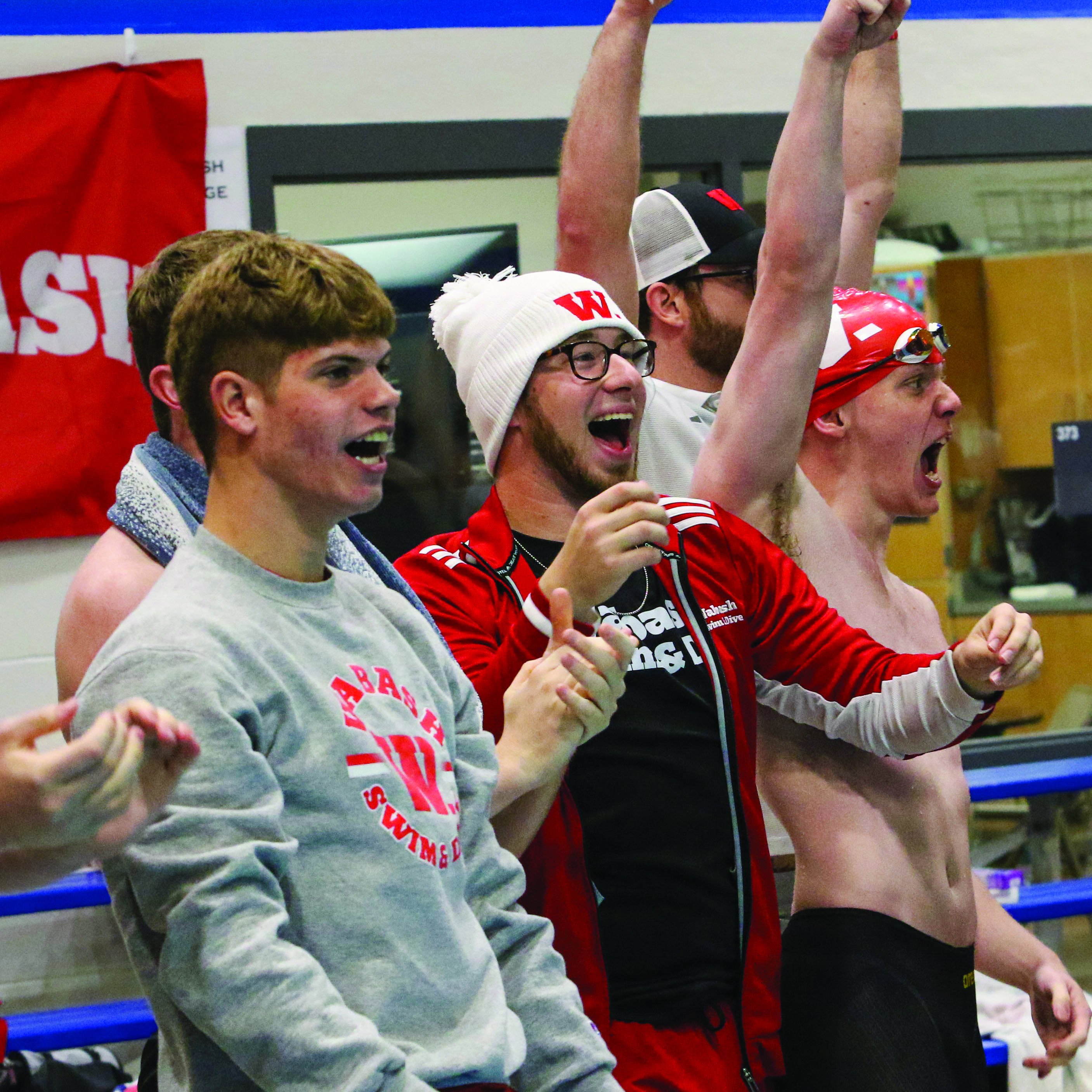 Dane Market ’26 (center) cheering on teammates