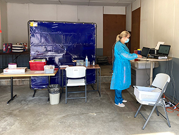 Amidon in the COVID-19 testing site inside the Hays House garage