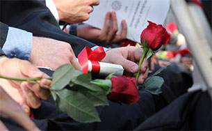 Wabash graduates traditionally receive a rose along with their sheepskin diplomas.