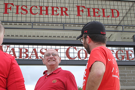 Fischer with Jeremy Hartnett at the dedication of Fischer Field