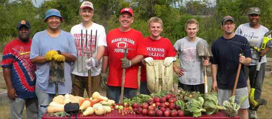 Dr. John Williams '85, MIke Kelley '70, Jim Dyer '83, Rob Dyer '13, Kenny Farris '12, Kevin Pastore '95). The people on either end are Gateway Greening volunteers - Victor Wood and Sandra Wood.