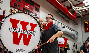 Jeremy Hartnett, professor of Classics, directs the Wabash pep band.