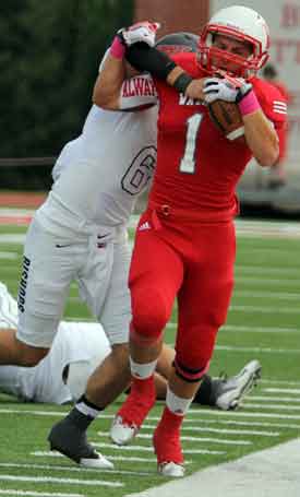 Hodges tip toes the sideline for a nice catch.