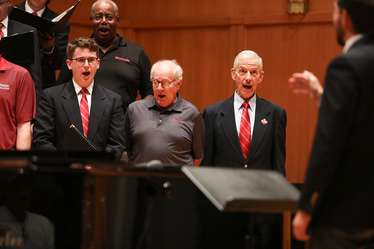 Largent sings alongside alumni at the 2025 Glee Club Homecoming Concert.