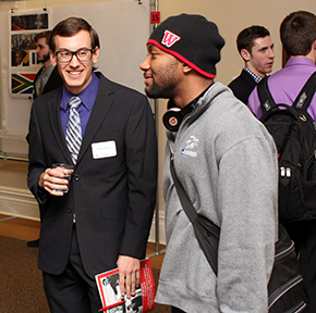 Horner (left) chats with Jordan Smith '17 prior to his reading.