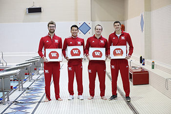 Jones, right, with this year's Swimming and Diving seniors