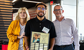 Beatty (center) receives the Luke Borinstein Award with Jill Rogers, associate GHI director (left) and Eric Wetzel, professor of biology and GHI director.