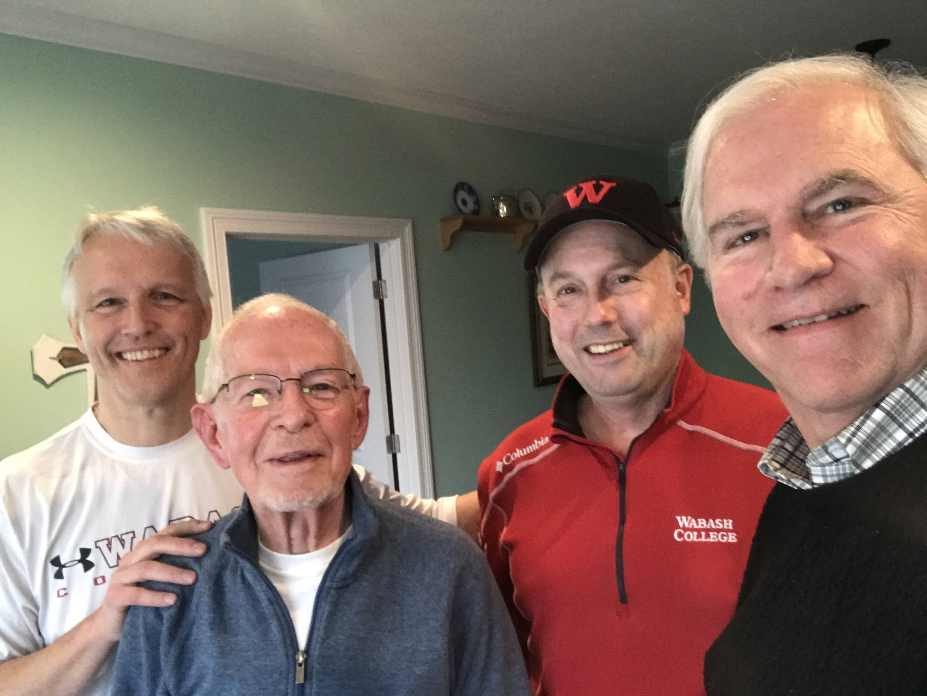 Dr. Chris Leagre ’83 (from left), Dr. Lester Hearson H’70, Dr. John Roberts ’83 and Dr. Randy Williams ’83 at Hearson’s home in January, when the alumni surprised their former teacher with news of the newly established scholarship in his honor.