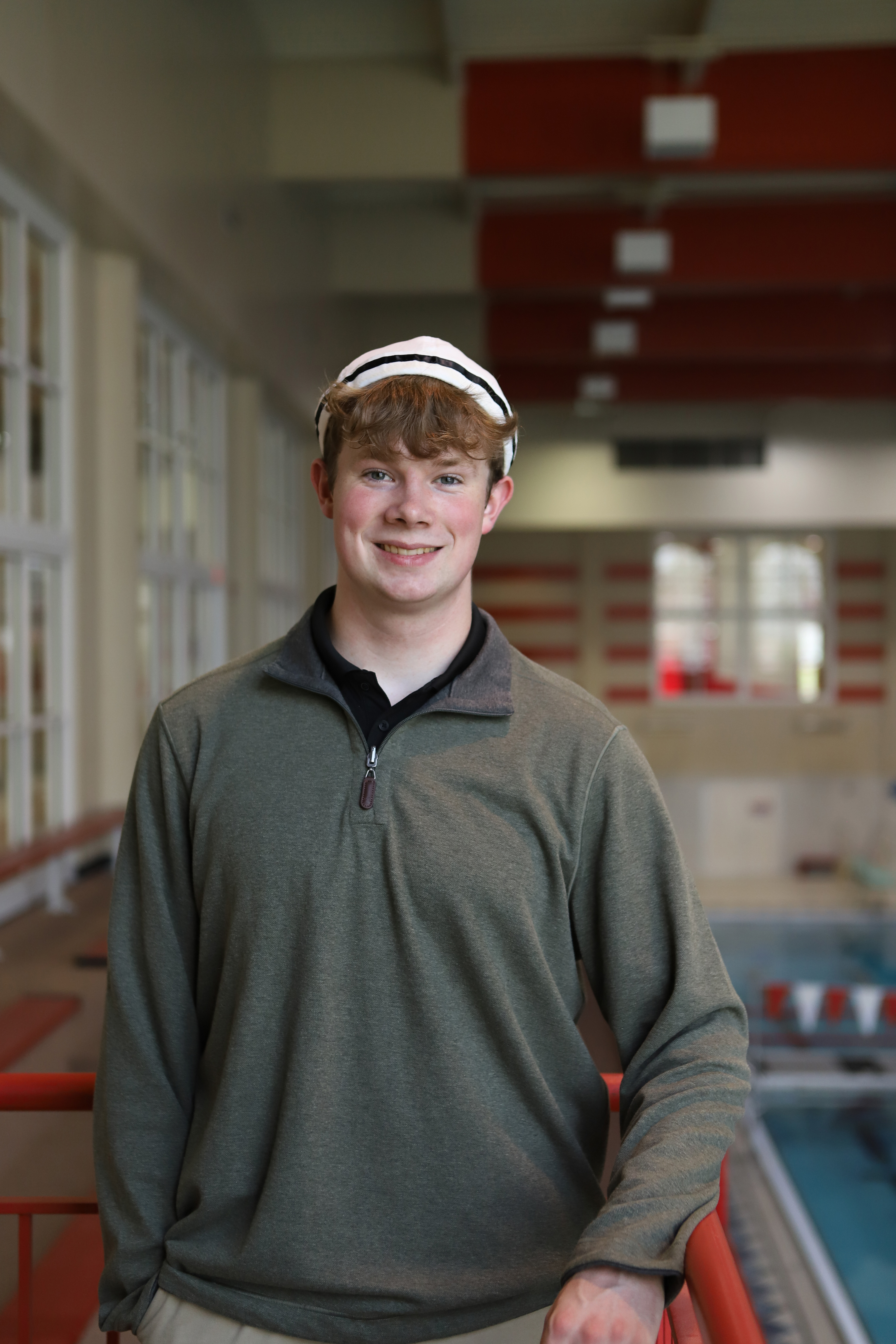 Aidan Mason &rsquo;26 in the Class of 1950 Natatorium.
