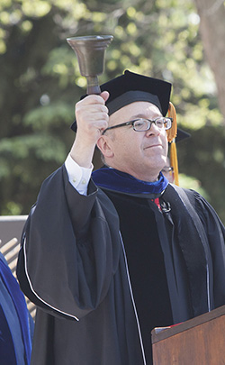 President Hess rings out the Class of 2015 on Sunday.