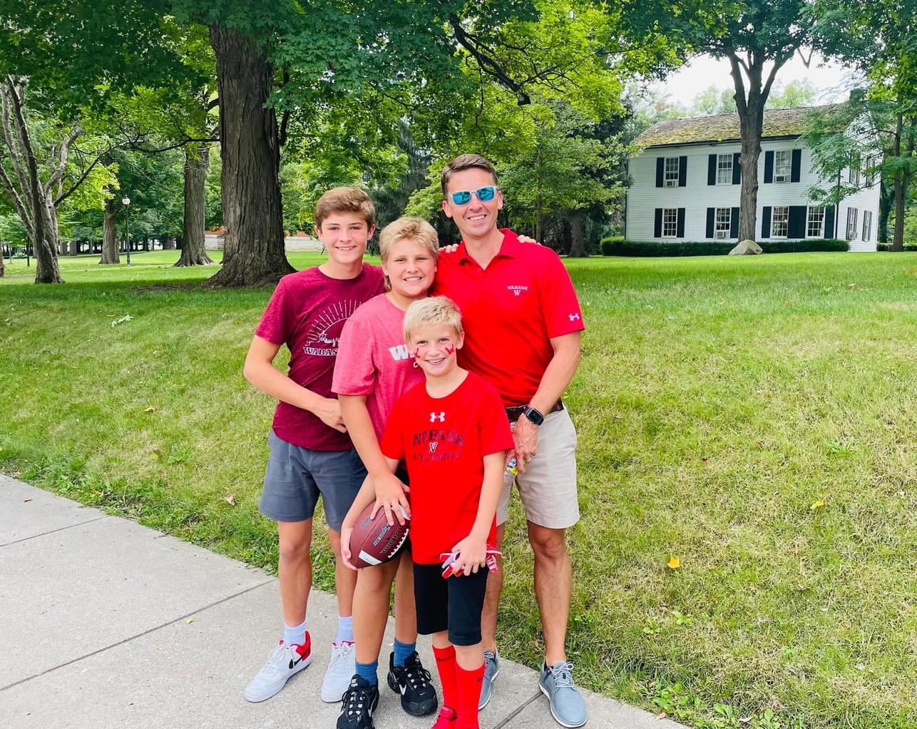 NAWM President Kip Chase ’03 and his sons, Jack, Andy, and Will. 