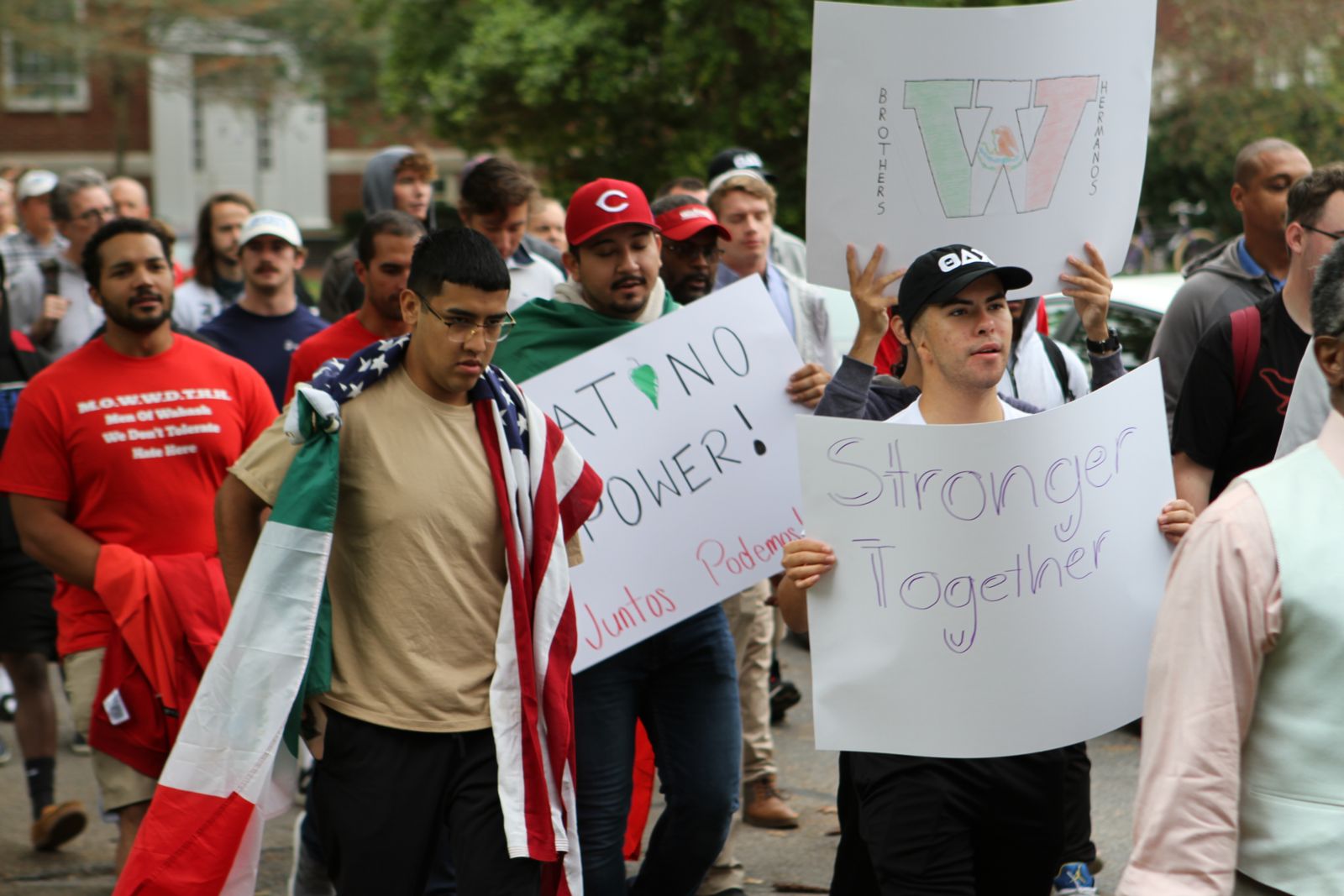 Students carried signs during the unity walk that displayed positive messages and images that show support toward equality.