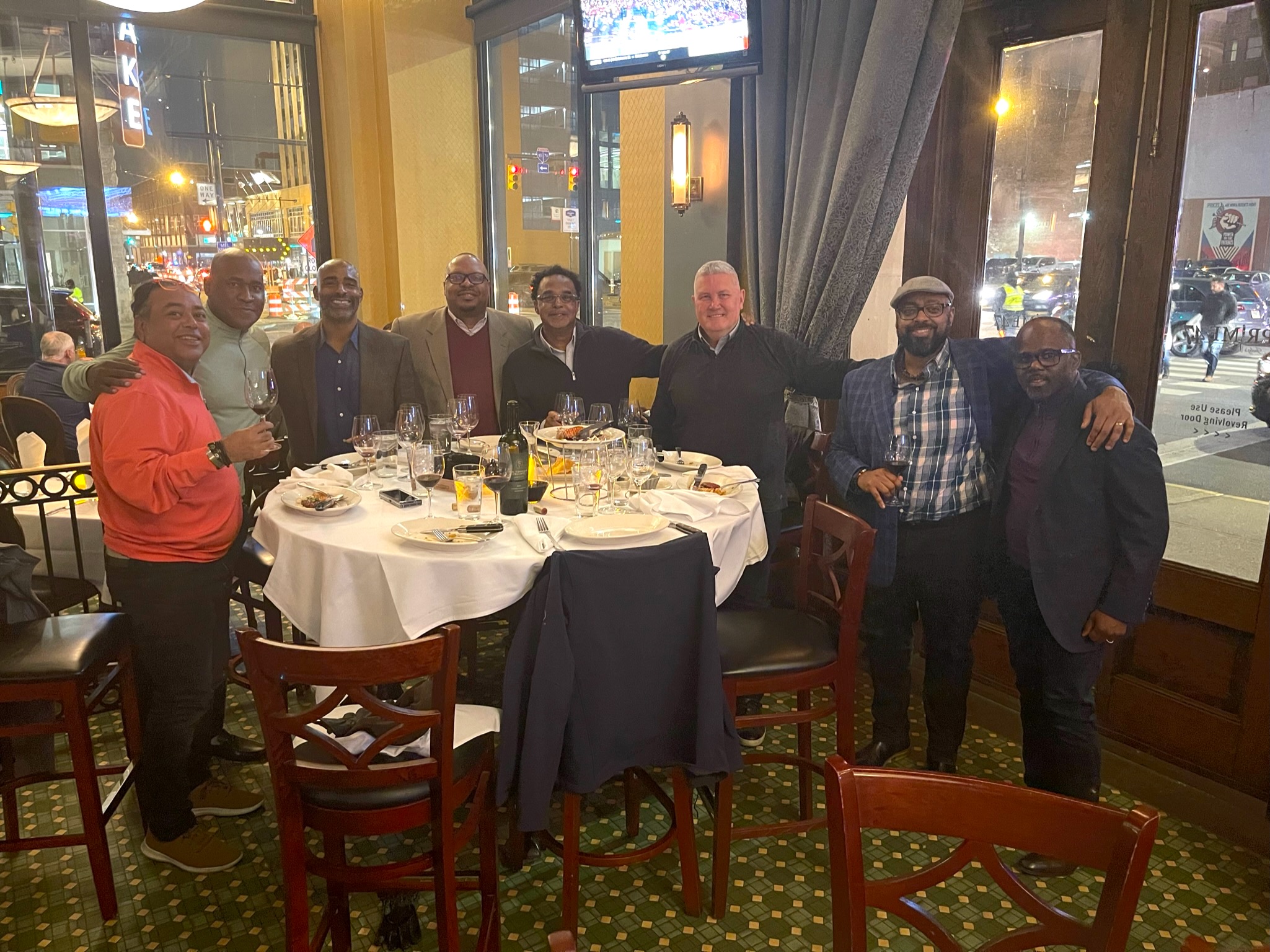 Munawar Ali (from left), Steve Garrett, Brian Henry, Dr. James Blackwell, Walter Blake, Clint Gassaway, Terrence Butler, Alonzo Weems enjoy a dinner together in Indianapolis. 