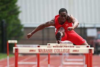 Jones clears a hurdle.