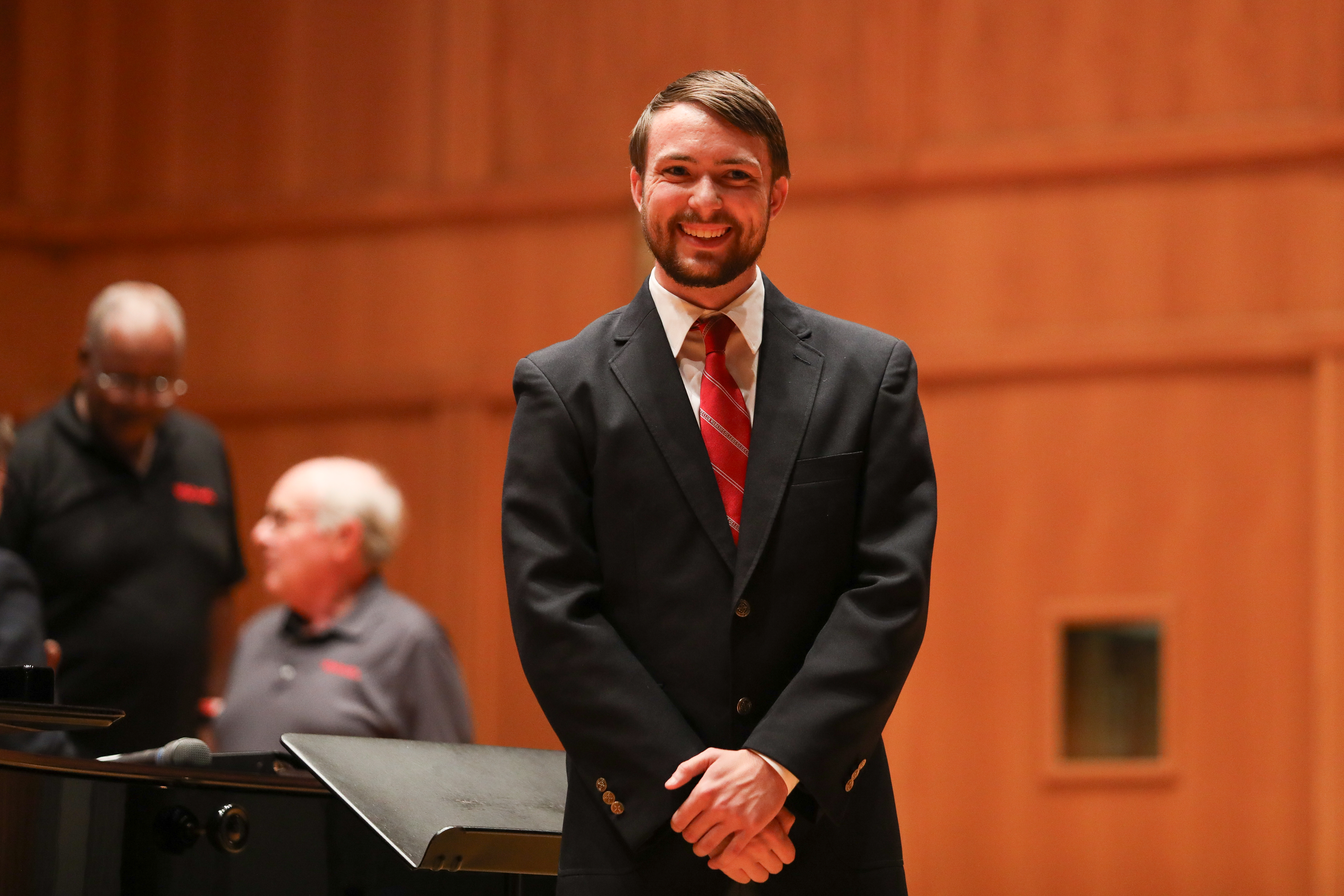 Kuhn takes the stage at the Glee Club's 2025 Homecoming Concert.