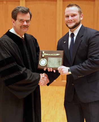 Prof. Tom Wilson '77 presents Kopitzke top honors.